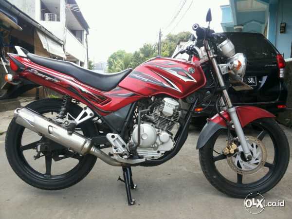 scorpio z cw th 2009 merah